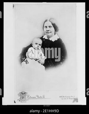 Lucy Stone with daughter Alice Stone Blackwell, half-length studio portrait, sitting, facing front Stock Photo