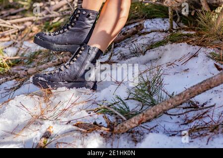 The woman boots on snow in Turkey mountains. Stock Photo