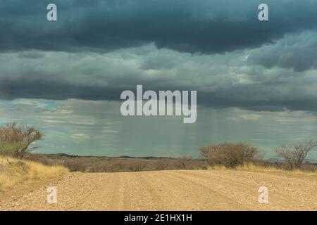 Landscape with rain clouds in the west of the capital Windhoek, Namibia Stock Photo