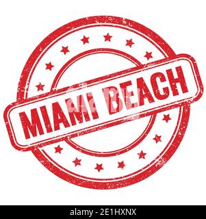 MIAMI BEACH text on red vintage grungy round rubber stamp. Stock Photo