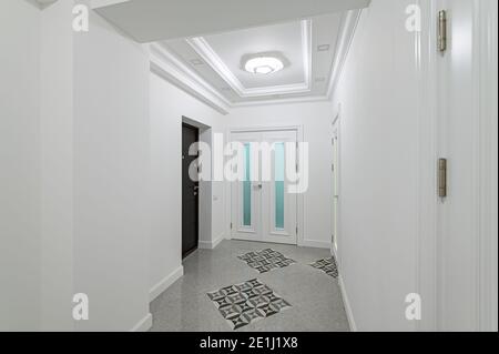 interior of white hallway with doors Stock Photo