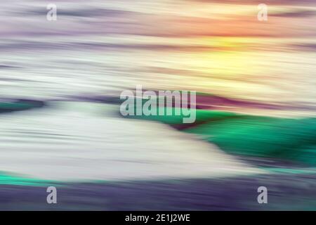 Motion blur abstract water colorful background. Green, purple and yellow Stock Photo