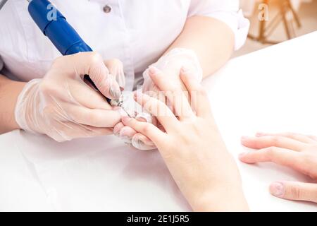Hardware processing of the nail plate close-up Stock Photo