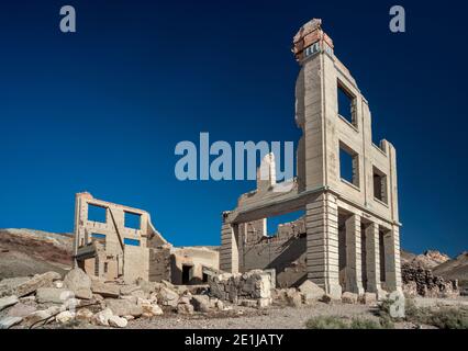 Cook Bank Building ruins in ghost town of Rhyolite, near Beatty and Death Valley, in Amargosa Desert, Nevada, USA Stock Photo