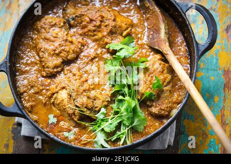 Punjabi chicken curry with coriander. Classic indian masala. Stock Photo