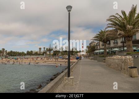 Mole, lighthouse and beach in Swakopmund, Namibia Stock Photo