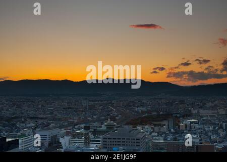 Sunshade on mountain above city view Stock Photo