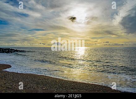 Fantastic lenticular clouds over the sea near Brighton on a cold December day. Stock Photo