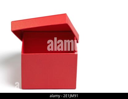 Empty red cardboard box against white background Stock Photo