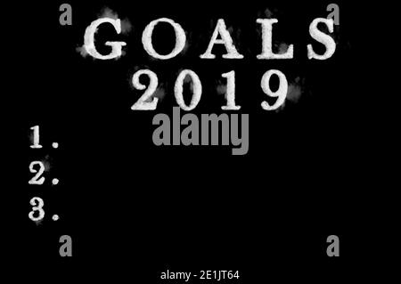 Goals 2019 in clouds shape on black background. Perfect for composition. Stock Photo
