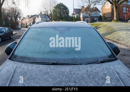 Frozen car window in cold weather spell Stock Photo