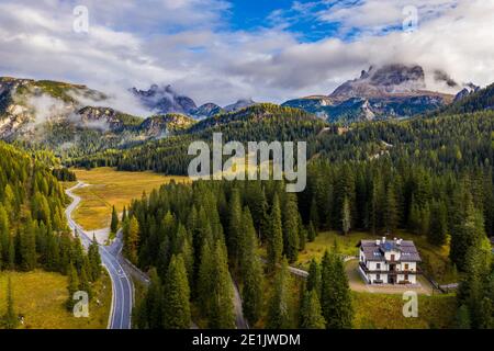 Scenic aerial view of a winding trekking path in a forest. Trekking path in the forest from above, drone view. Aerial top view of a trail in the middl Stock Photo