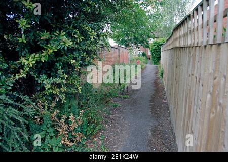 Alleyway between two house in an English town Stock Photo