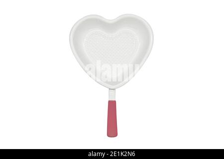 White heart shaped ceramics baking dish cooking pan on white Stock Photo