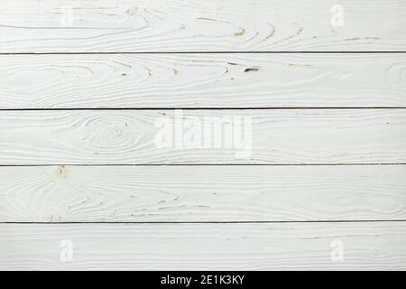 Wooden decorative background with copy space. White larch board with knots and holes, abstract texture. Empty template. Concept of natural materials f Stock Photo