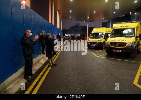 Manchester, UK. 7th Jan 2021. Members of the public applaud at Salford Royal Hospital as Clap for Carers returns under a new name of Clap for Heroes. The weekly applause for front-line NHS staff and other key workers ran for 10 weeks during the UK's first coronavirus lockdown. Credit: Jon Super/Alamy Live News Stock Photo