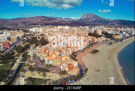 Aerial drone point panoramic view coastline and La Vila Joiosa Villajoyosa touristic resort townscape view from top, sandy beach and mediterranean sea Stock Photo