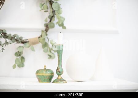 A wreath of eucalyptus in the interior. Japanese design combined with Scandinavian minimalism in a modern light house-Japandi. Soothing decor for Stock Photo