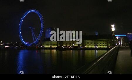Screen grab taken from PA Video of the London Eye in Southbank, London, which has been lit up blue in a renewed gesture of thanks to the NHS and frontline workers. Stock Photo