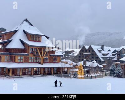 Stowe Mountain resort Spruce peak village at evening time early December 2020 Vermont, USA Stock Photo