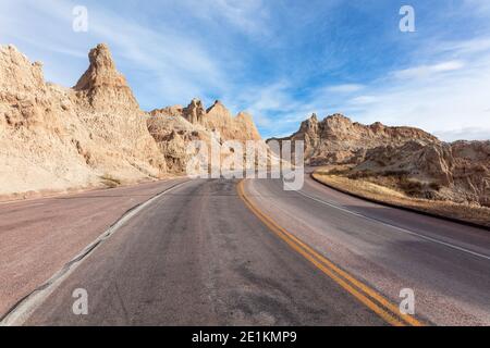 A winding road through Badlands National Park, South Dakota, USA Stock Photo