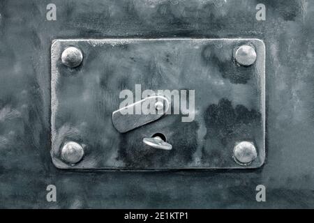 Internal lock of the safe close-up. A brutal metal savings box. The concept of reliable protection of deposits Stock Photo