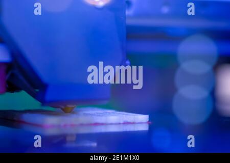 Three dimensional printing machine prints physical 3D model - close up Stock Photo