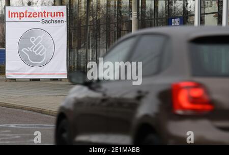 Dresden, Germany. 08th Jan, 2021. A banner with the inscription 'Vaccination Center Saxony' hangs in front of the Messe Dresden. The official start of the vaccination centres in Saxony begins on 11.01.2020. Credit: Robert Michael/dpa-Zentralbild/dpa/Alamy Live News Stock Photo