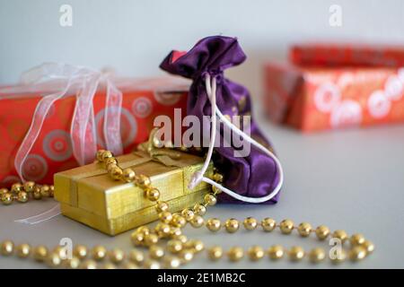 a selection of wrapped Christmas gifts ready to be opened Stock Photo