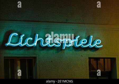 Neon sign lettering in german , LiIGHT GAMES , so cinema Stock Photo