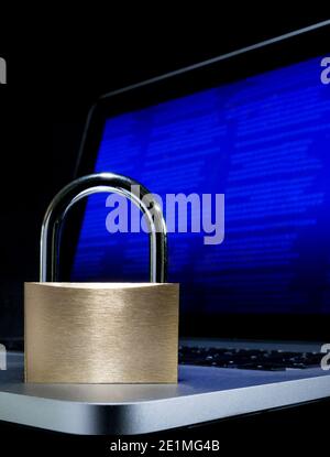 A padlock and computer, online security concept image. Stock Photo