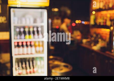 Background Blurred Defocused Beers are cooling in fridge, freezer or refrigerator shelf Stock Photo