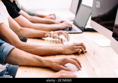 close up. a group of employees work on their computers Stock Photo