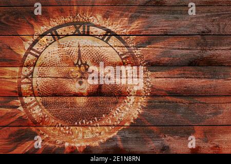 The illustration on the wooden background of the abstract clock showing the approach of the new year Stock Photo