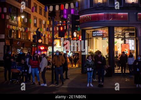 Street Scene Around Chinatown at Night, Soho, London, Britain, December 2020 Stock Photo