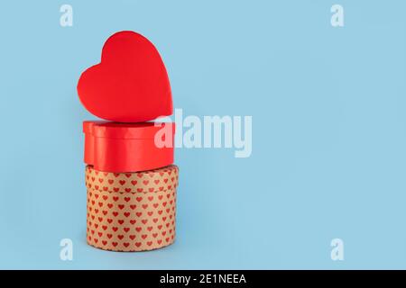 Valetines day gift box o blue background. Copy space for text on blank heart shaped boxes Stock Photo