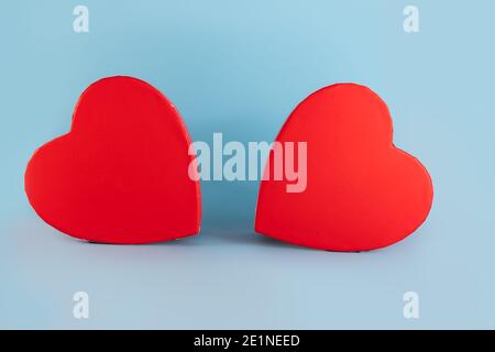 Valetines day gift box o blue background. Copy space for text on blank heart shaped boxes Stock Photo