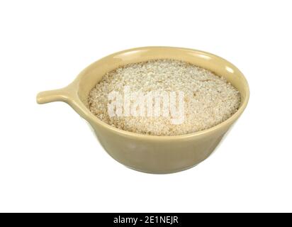 Pile of breadcrumbs in a bowl isolated on white background Stock Photo