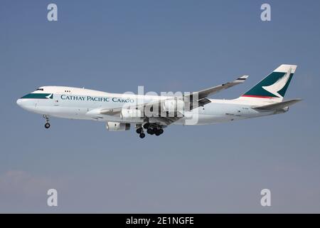 Cathay Pacific Cargo Boeing 747-400F with registration B-HUH on short final for runway 25L of Frankfurt Airport. Stock Photo