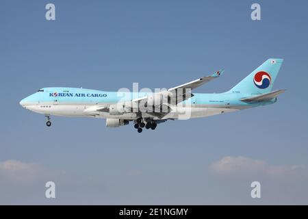 Korean Air Cargo Boeing 747-400F with registration HL7472 on short final for runway 25L of Frankfurt Airport. Stock Photo