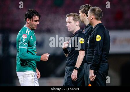 NIJMEGEN, NETHERLANDS - JANUARY 8: (L-R): Sander Fischer of SBV Excelsior after defeat with, Referee Ingmar Oostrom during the Dutch Keukenkampioendiv Stock Photo