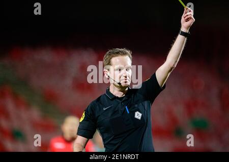 NIJMEGEN, NETHERLANDS - JANUARY 8: (L-R): Referee Ingmar Oostrom showing yellow card during the Dutch Keukenkampioendivisie match between NEC and Exce Stock Photo