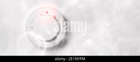smoke detector of fire alarm in action Stock Photo
