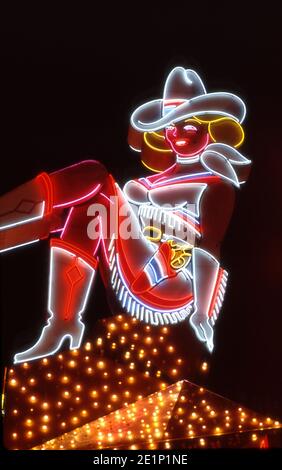 Iconic Cowgirl neon sign on Fremont Street in Downtown Las Vegas, Nevada