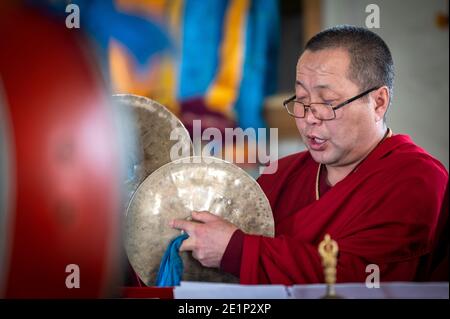 Atsagatsky Datsan temple, Ulan Ude, Siberia, Russia - March 09, 2020 : Buddhist monks are reading mantras in Dzogchen Duga. Buddhist monks are praying Stock Photo