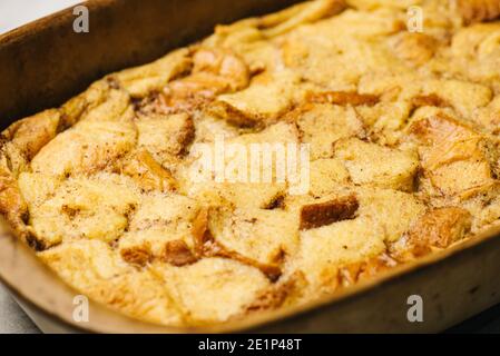 Fresh baked French Toast Casserole in a stoneware baking pan Stock Photo