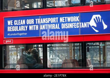 London, Britain. 8th Jan, 2021. passengers are seen in a red bus in London, Britain, Jan. 8, 2021. Britain recorded another 68,053 coronavirus cases, the highest ever daily increase since the pandemic began in the country, official figures showed Friday.The total number of coronavirus cases in the country stands at 2,957,472, the data showed. Also on Friday, Mayor of London Sadiq Khan declared a 'major incident' in the British capital as rising coronavirus cases are threatening to overwhelm hospitals. Credit: Han Yan/Xinhua/Alamy Live News Stock Photo