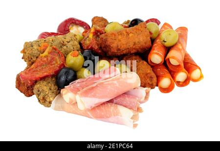 Group of savoury appetizer snacks including stuffed olives, lamb and chicken koftas and rollitos isolated on a white background Stock Photo