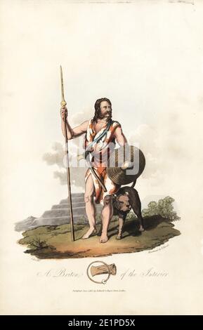 A Briton of the interior, carrying tarian (shield), fon-wayw (spear) and bwyell-arv (battle axe), from the pre-Roman era. In front of a Catterthun fortress. Handcoloured aquatint by R. Havell from an illustration by Charles Hamilton Smith from Samuel Meyrick's Costume of the Original Inhabitants of the British Islands, London, 1821. Stock Photo