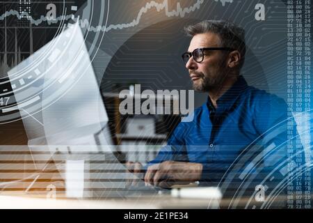 Financial And Marketing Data Analyst Man Using Computer Stock Photo